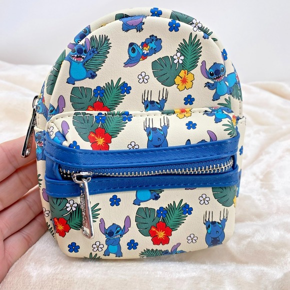 Loungefly Handbags - Loungefly Disney Parks Stitch Tropical Floral Wristlet Mini Backpack New
